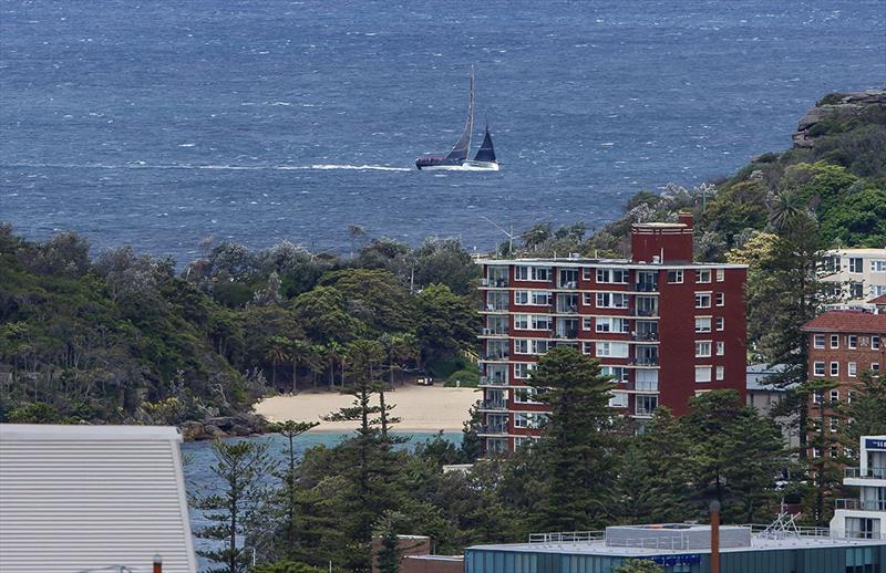 Moneypenny passes Shelly Beach approaching North Head photo copyright Bow Caddy Media taken at Cruising Yacht Club of Australia and featuring the IRC class