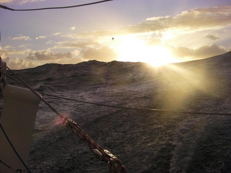 Global Solo Challenge - Sun setting over big Southern Ocean Waves photo copyright Global Solo Challenge taken at  and featuring the IRC class