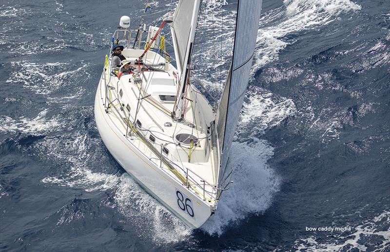 Crux powering over the swell photo copyright Bow Caddy Media taken at Cruising Yacht Club of Australia and featuring the IRC class