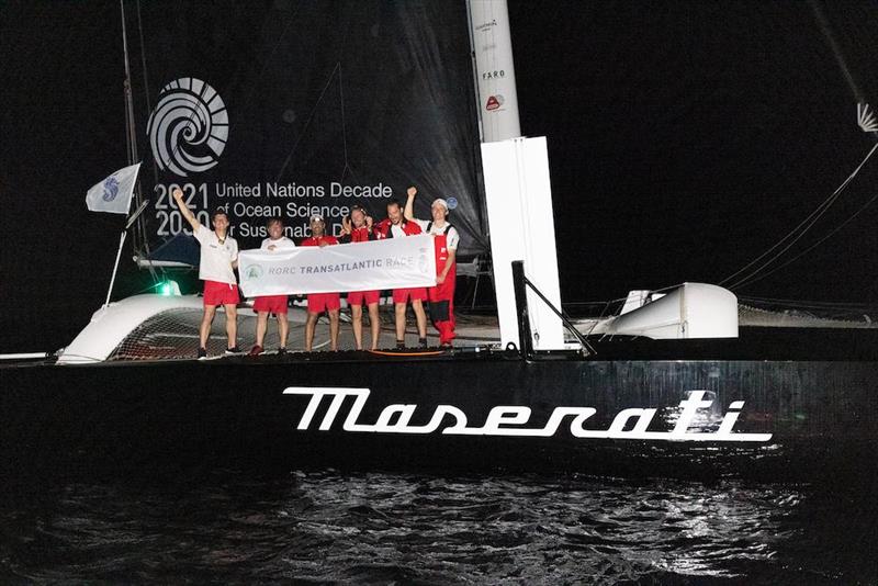 Celebrations on board Giovanni Soldini's Italian Multi70 Maserati after crossing the finish line in Grenada first after eight days of extraordinary racing in the RORC Transatlantic Race  photo copyright RORC / Arthur Daniel taken at Royal Ocean Racing Club and featuring the IRC class
