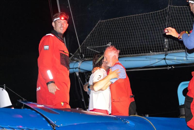 Friendly rivalry - Left: Ned Collier Wakefield, Right: Giovanni Soldini (Maserati) congratulations Peter Cunningham and the team on PowerPlay after their close battle across the Atlantic from Lanzarote - 2022 RORC Transatlantic Race photo copyright RORC / Arthur Daniel taken at Royal Ocean Racing Club and featuring the IRC class