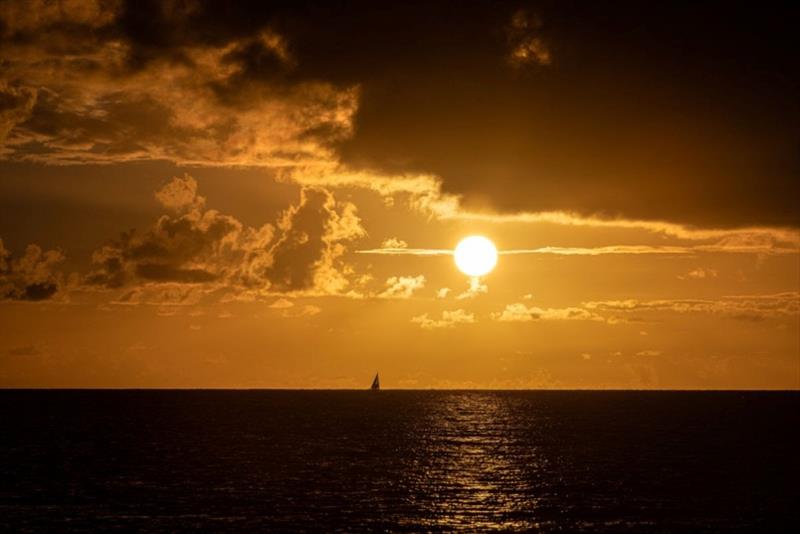 Sunset on approach to Carriacou - Island Water World Grenada Sailing Week day 1 photo copyright Arthur Daniel taken at  and featuring the IRC class