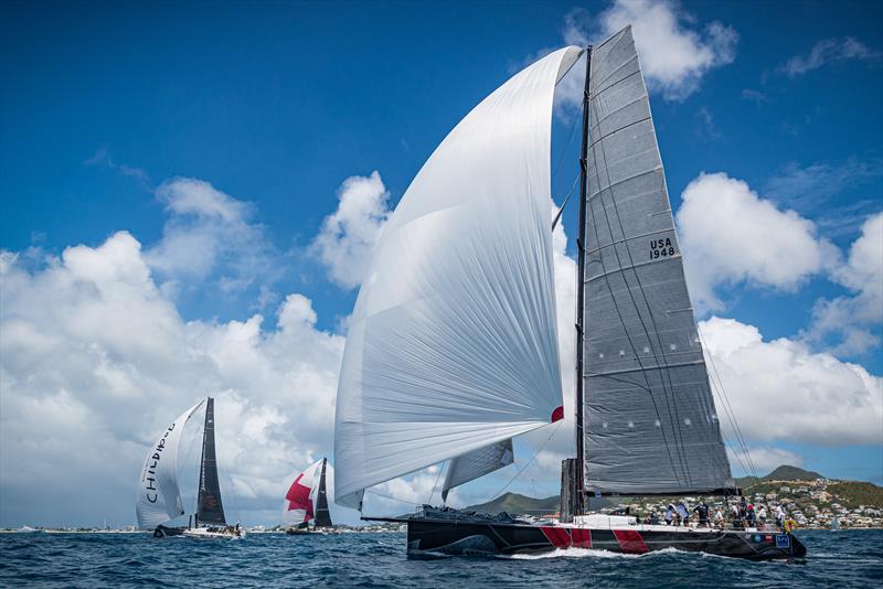 The Volvo fleet races to the finish, featuring Il Mostro (VO70) and Janssen de Jong - Dutchsail (VO65) on day 1 of the St. Maarten Heineken Regatta - photo © Laurens Morel