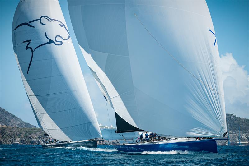 Leopard3 stalks Deep Blue on their final gybes into finish on day 1 of the St. Maarten Heineken Regatta - photo © Laurens Morel