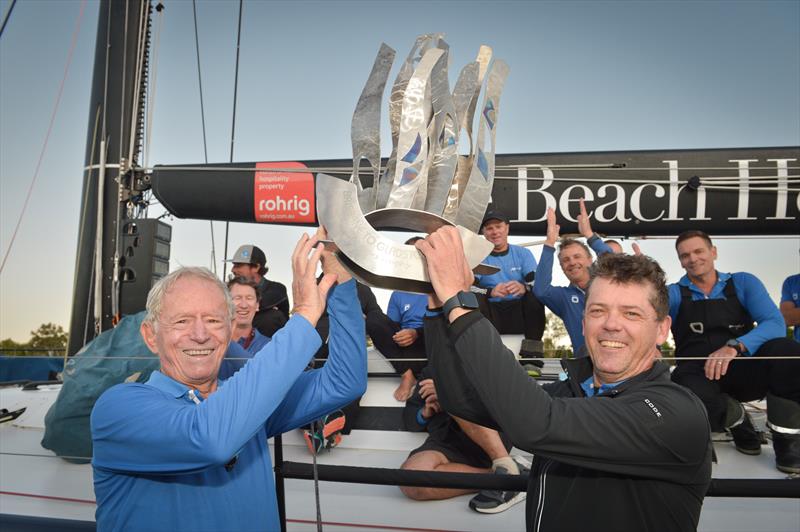 Peter Harburg, Mark Bradford and the Black Jack crew celebrate winning line honours and smashing their race record in the 74th Brisbane to Gladstone Yacht Race - photo © Andra Bite