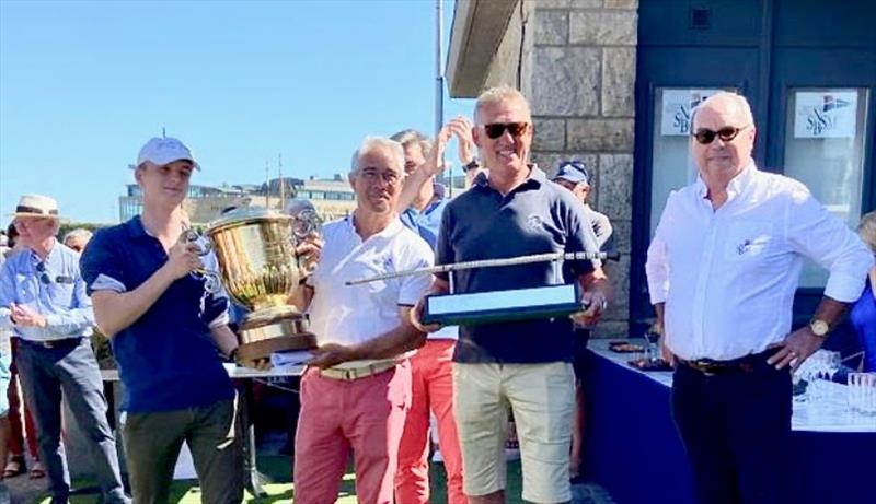 Henri Vergnoux (right of picture) and the Arabel crew receives the King Edward VII Cup for the overall win in the RORC Cowes Dinard St Malo Race and the IR Trophy for IRC 4. - photo © Steve Cole / RORC