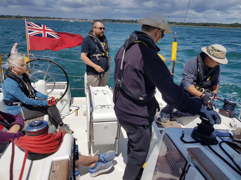 Learning the ropes at Visually Impaired Sailing Week 2022 photo copyright Sailing Vision Trust taken at Royal Lymington Yacht Club and featuring the IRC class