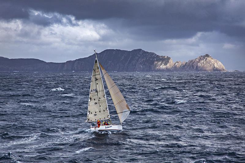 Audacious with dramatic South West Cape backdrop photo copyright Richard Bennett taken at Ocean Racing Club of Victoria and featuring the IRC class