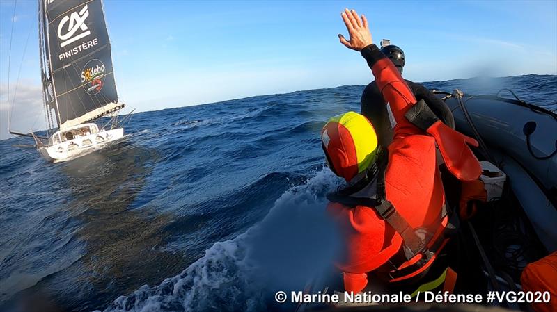 Escoffier waves goodbye as his rescuer, Jean le Cam, continues the race – 2020/21 Vendée Globe photo copyright Marine Nationale / Defense #VG2020 taken at  and featuring the IRC class