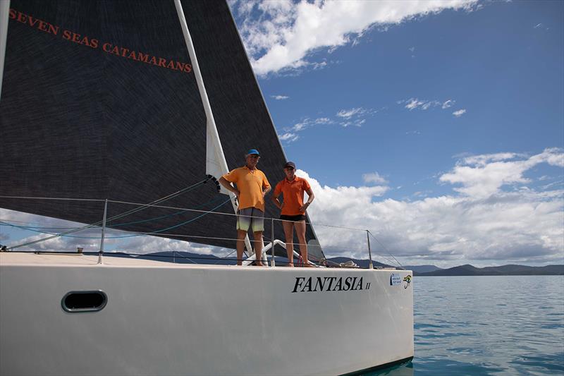 Andrew and Mara Stransky on the bow of Fantasia - Airlie Beach Race Week photo copyright Shirley Wodson taken at Whitsunday Sailing Club and featuring the IRC class