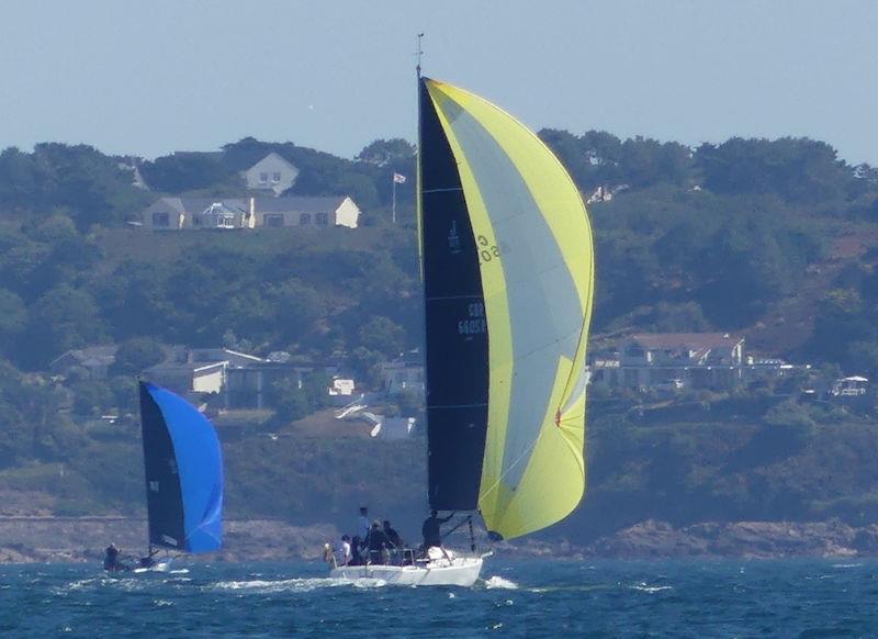 The Dog's and Jewel in St Ouen's Bay during the RCIYC Rossborough Round the Island Race 2022 photo copyright Bill Harris taken at Royal Channel Islands Yacht Club and featuring the IRC class