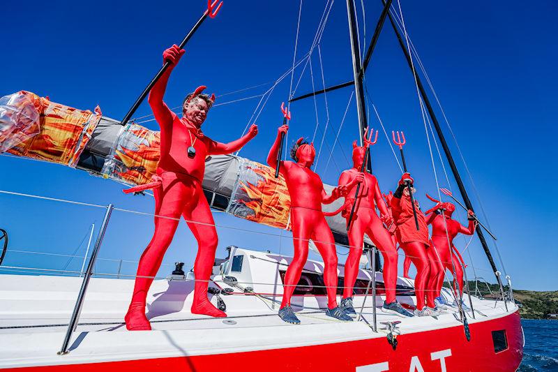 Lycra wearing crew of Hot Seat on day 4 at 2022 Hamilton Island Race Week photo copyright Salty Dingo taken at Hamilton Island Yacht Club and featuring the IRC class