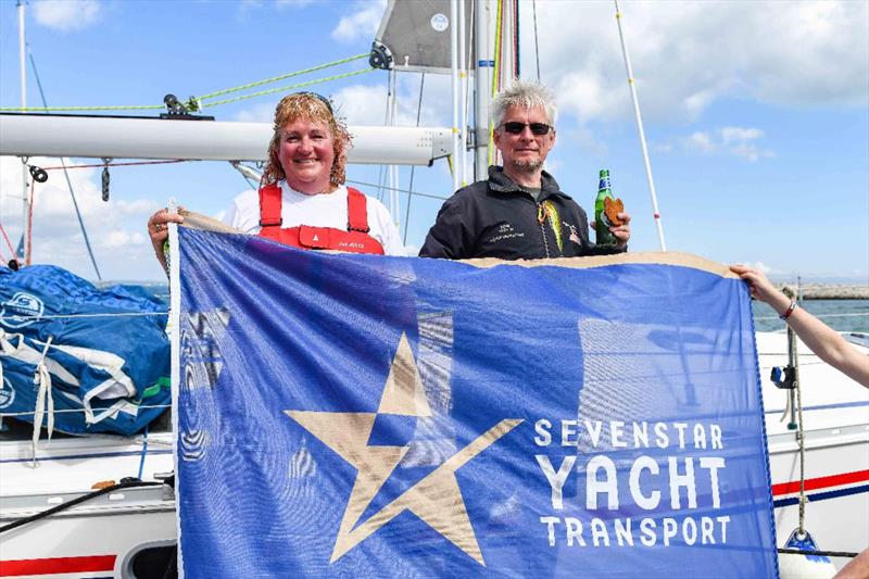 Celebrations and welcome dockside for AJ Wanderlust photo copyright James Tomlinson taken at Royal Ocean Racing Club and featuring the IRC class