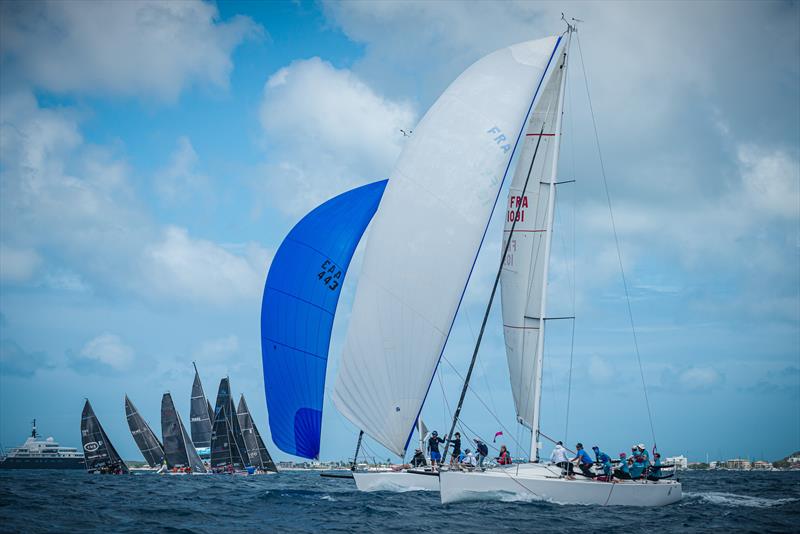 Move over superyachts, we're racing here! SMHR Race committee manages the perfect dance between fleets, with many starts and finishes going on in Simpson Bay throughout the day! - photo © Laurens Morel