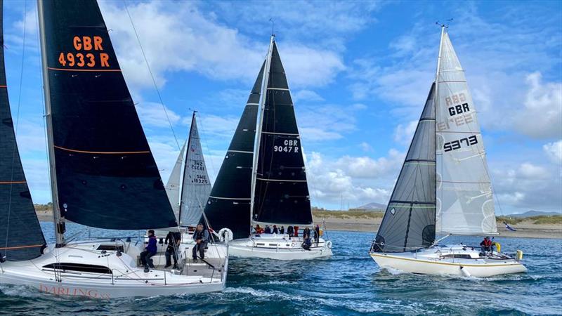 Pwllheli Autumn Challenge Series: Close racing along the beach photo copyright Sioned Owen taken at Pwllheli Sailing Club and featuring the IRC class