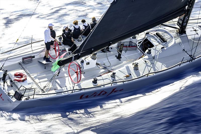 Márton Józsa at the helm of Wild Joe - there were only two moments of the race when there was any decent breeze: in the Strait of Messina and heading south to Pantelleria - Rolex Middle Sea Race photo copyright Kurt Arrigo / Rolex taken at Royal Malta Yacht Club and featuring the IRC class