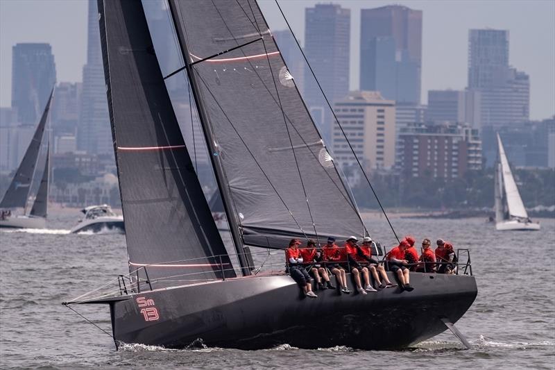 Rob Date's Scarlet Runner looks deadly on the race track in the Cock of the Bay Yacht Race - photo © Michael Currie