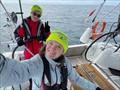 Jolene Laverick-Thorn winner of KISS Passage Radio Operator Trophy aboard Jeanneau 349 Kiela with Julia Capiliou on the helm © KISS Media