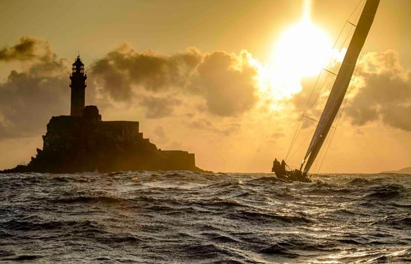 Few sights are more classic in the sailing world than that of a fast yacht rounding the world-famous Fastnet Rock. - photo © Kurt Arrigo/ROLEX