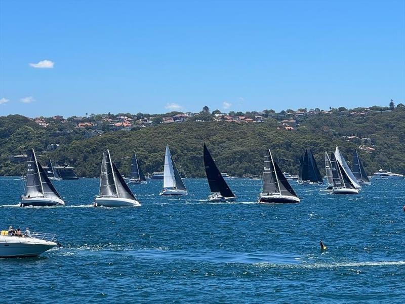 4 x Sun Fast 3300's heading upwind on starboard tack just after the start in the 2022 Rolex Sydney to Hobart Yacht Race photo copyright Charles Ip taken at Cruising Yacht Club of Australia and featuring the IRC class