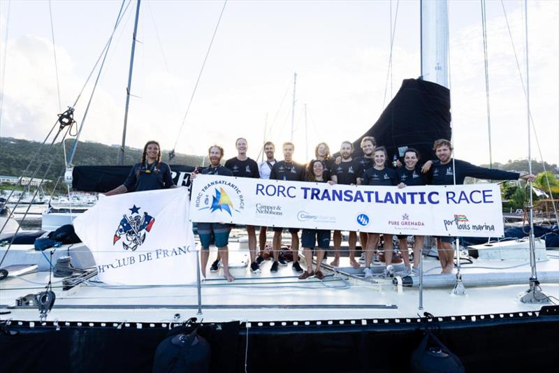 Celebrating after the finish in Grenada. Proudly displaying the flag of the Yacht Club de France, the Pen Duick crew of 12 were the youngest in the race - RORC Transatlantic Race photo copyright Arthur Daniel / RORC taken at Royal Ocean Racing Club and featuring the IRC class