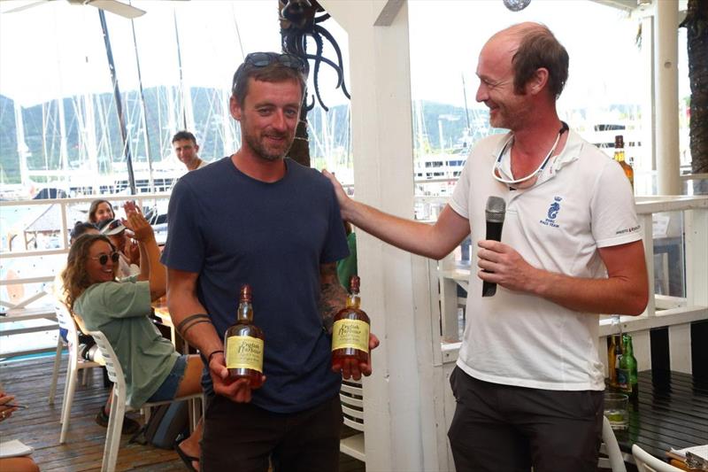David Hanks, Skipper of Antiguan Farr 65 Spirit of Juno receives English Harbour Rum prizes from the PRO Stefan Kunstmann - RORC Nelson's Cup Series - photo © Tim Wright / Photoaction.com