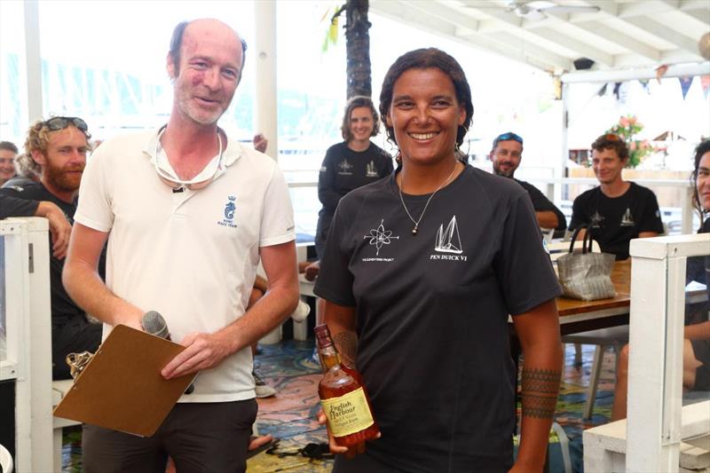 Marie Tabarly receiving a bottle of English Harbour Rum after the second day of racing at the RORC Nelson's Cup Series in Antigua - photo © Tim Wright / www.photoaction.com