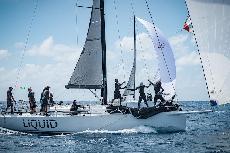 Team Liquid represents the best of Antigua's homegrown talent, with sailors from 17-25 years old making up this winning team - all brought together by the visionary owner Pamala Baldwin - St. Maarten Heineken Regatta day 2 - photo © Laurens Morel / www.saltycolours.com