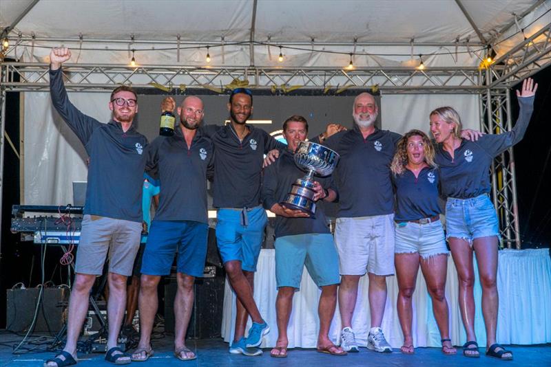 A happy team on Geoff Manchester's J/133 Vamoose (USA) - celebrating their overall win at the Peters & May Round Antigua Race - photo © Visual Echo
