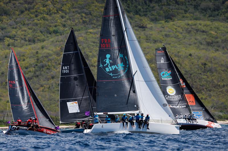 The competitive fleet in CSA Racing 5 is led by GFA Caraïbes - La Morrigane at Antigua Sailing Week 2023 photo copyright Paul Wyeth / www.pwpictures.com taken at Antigua Yacht Club and featuring the IRC class