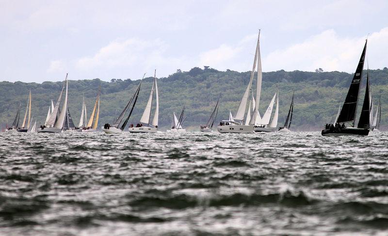 The 2023 Round the Island Race fleet pass through the Hurst narrows photo copyright Sam Jardine taken at Island Sailing Club, Cowes and featuring the IRC class