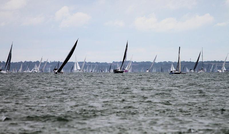 The 2023 Round the Island Race fleet pass through the Hurst narrows photo copyright Sam Jardine taken at Island Sailing Club, Cowes and featuring the IRC class