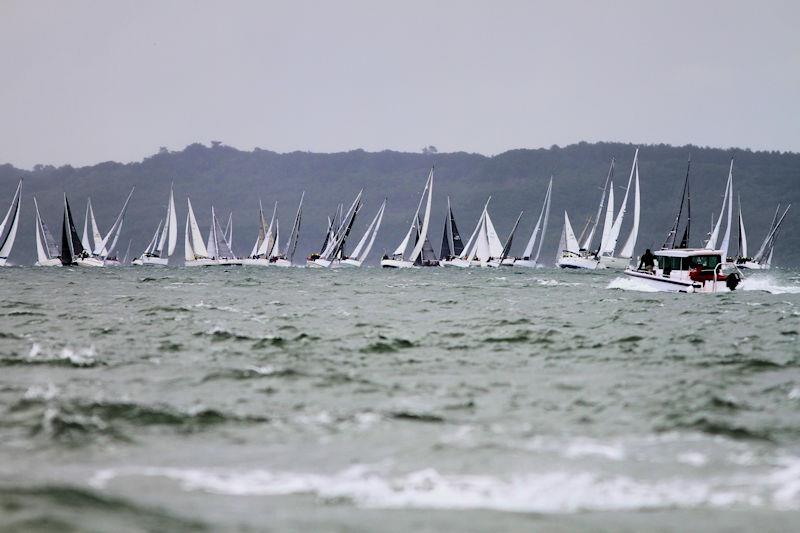 The 2023 Round the Island Race fleet pass through the Hurst narrows photo copyright Sam Jardine taken at Island Sailing Club, Cowes and featuring the IRC class