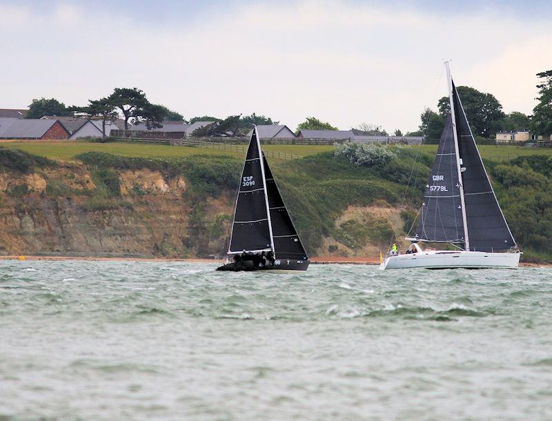 The 2023 Round the Island Race fleet pass through the Hurst narrows photo copyright Sam Jardine taken at Island Sailing Club, Cowes and featuring the IRC class