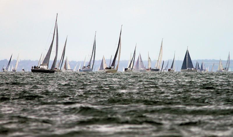 The 2023 Round the Island Race fleet pass through the Hurst narrows photo copyright Sam Jardine taken at Island Sailing Club, Cowes and featuring the IRC class