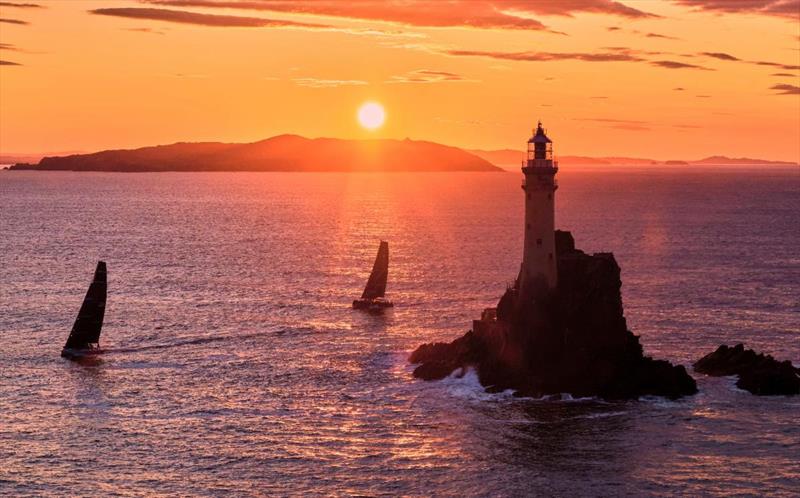Warm sunrise as PAC 52 Warrior Won and ORC50 Lodigroup round the Fastnet Rock in the 50th Rolex Fastnet Race - photo © Rolex / Carlo Borlenghi