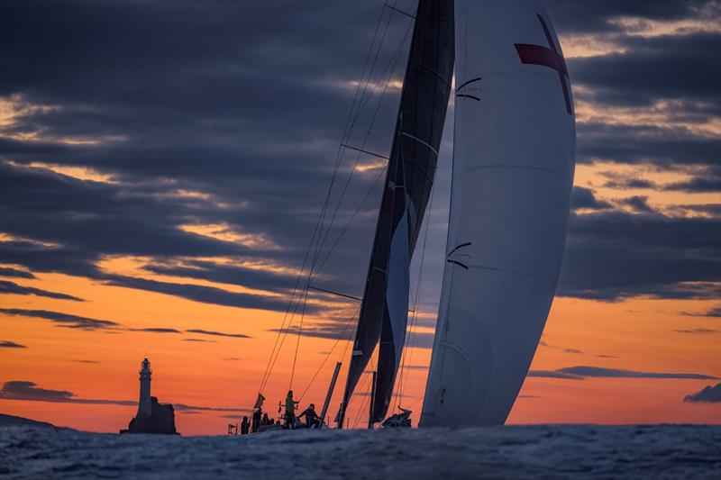 The rock provides a compelling spectacle at dawn on the third day of the Rolex Fastnet Race photo copyright Kurt Arrigo / Rolex taken at Royal Ocean Racing Club and featuring the IRC class