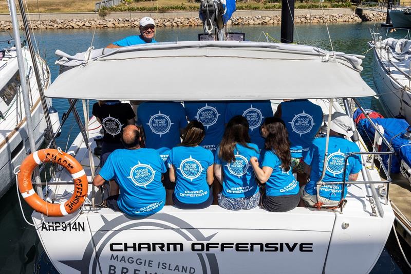The Charm Offensive crew - owner James Permezel is part owner of Maggie Island Brewery - SeaLink Magnetic Island Race Week photo copyright Andrea Francolini / SMIRW taken at Townsville Yacht Club and featuring the IRC class