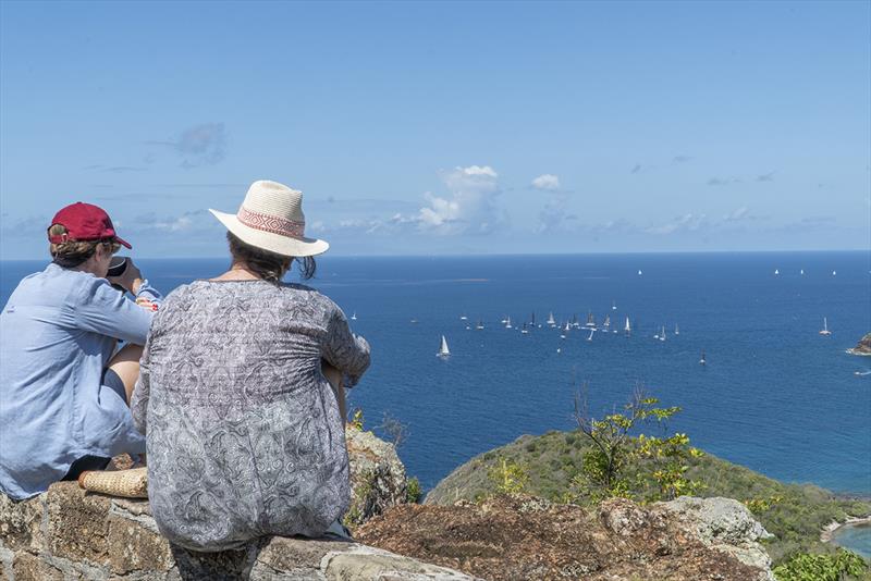 Spectators take in the racing from land at the Shirley Heights Lookout vantage point - Antigua Sailing Week photo copyright Visual Echo taken at Antigua Yacht Club and featuring the IRC class