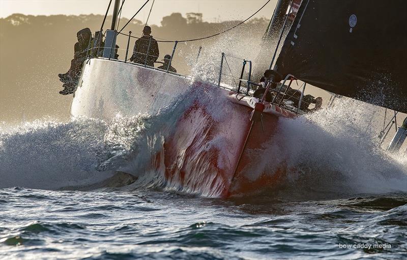 andoo Comanche punches out through Sydney Heads photo copyright Bow Caddy Media taken at Cruising Yacht Club of Australia and featuring the IRC class