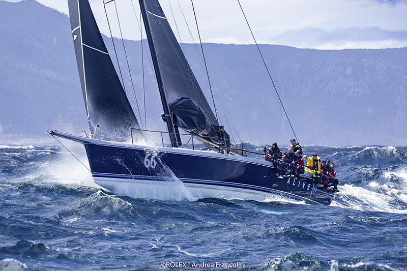 Alive powering through the waves near Tasman Island - 2023 Rolex Sydney Hobart Yacht Race photo copyright Rolex / Andrea Francolini taken at Cruising Yacht Club of Australia and featuring the IRC class