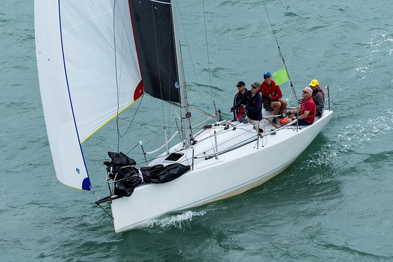 Tim Campbell (red shirt and sunnies) at the helm of Private Equity - SeaLink Magnetic Island Race Week photo copyright Andrea Francolini taken at Townsville Yacht Club and featuring the IRC class