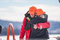 Andrew and Mary Ann embracing after completing their Hobart race in 2024 © Salty Dingo