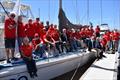 A red sea of volunteers onboard Tasmanian boat, Midnight Rambler, before they leave for Sydney
