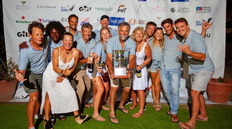 WaveWalker celebrate their CSA Racing 2 win - Antigua Sailing Week photo copyright Travis Harris / 268 Media taken at Antigua Yacht Club and featuring the IRC class