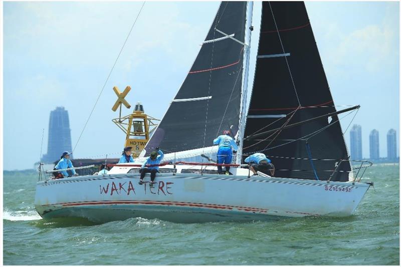 Sailors aboard Waka Tere working in sync during the regatta - photo © Howie Choo