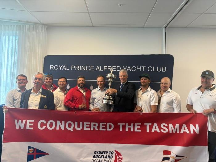 Commodore McClelland (blue blazer left side) and Lucky crew (owner Bryon Ehrhart in suit with Lipton Cup) - Sydney to Auckland Ocean Race photo copyright RAYC taken at Royal Prince Alfred Yacht Club and featuring the IRC class