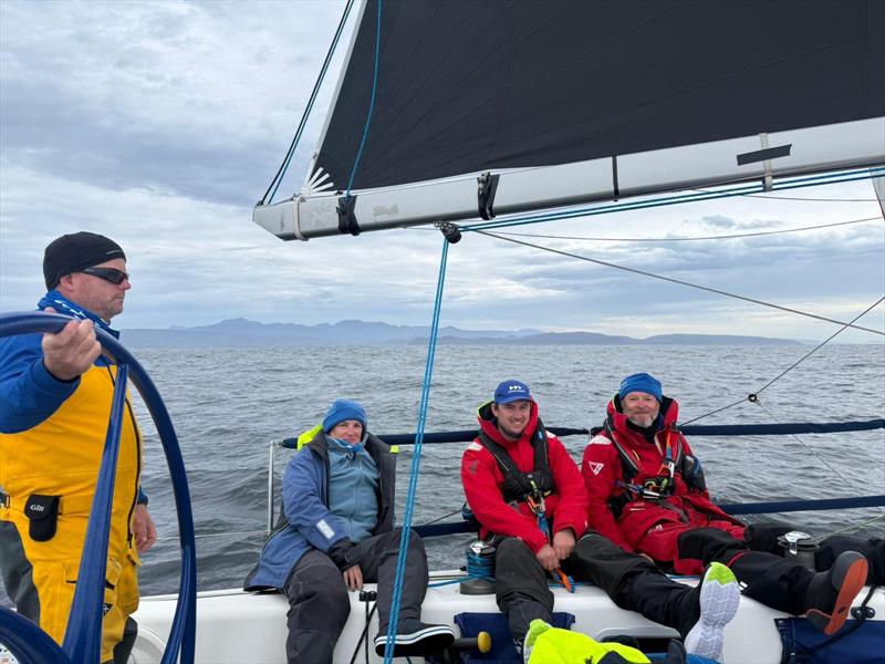 Karl Civil on the helm of Faster Forward - photo © Matt Fahey