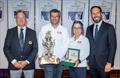 Dr Sam Haynes, Commodore of the CYCA; Alexis Loison and Jiang Lin co-skippers of the overall winning yacht Min River; Eduardo Maclean, Rolex Australia 