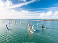 Fleet heading around the north of Green Island on day 3 of Brisbane Race Week 2026 &copy; Nic Douglass for @sailorgirlHQ